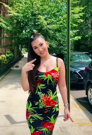 2. Sexy Enisa Shows Cleavage in Floral Dress in a Street