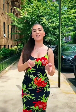 4. Sexy Enisa Shows Cleavage in Floral Dress in a Street