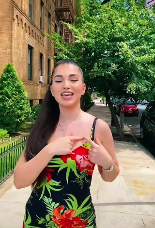 5. Sexy Enisa Shows Cleavage in Floral Dress in a Street