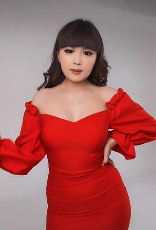 Sexy Asem Nygmetzhan Shows Cleavage in Red Dress