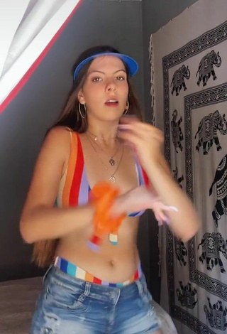 3. Beautiful Esther Martinez Shows Cleavage in Sexy Striped Bikini Top