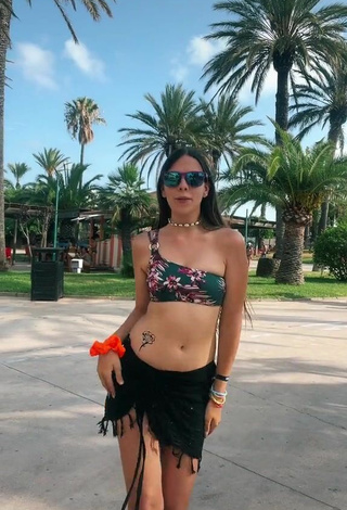Cute Esther Martinez Shows Cleavage in Floral Bikini Top