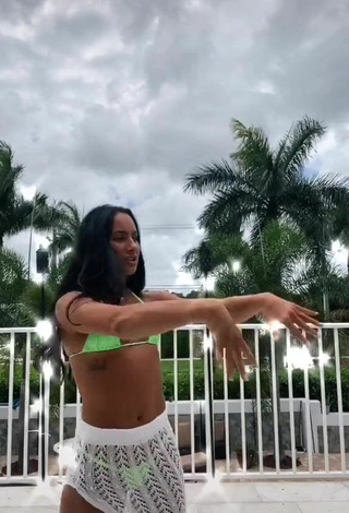 Sexy Gabi Butler Shows Cleavage in Light Green Bikini Top