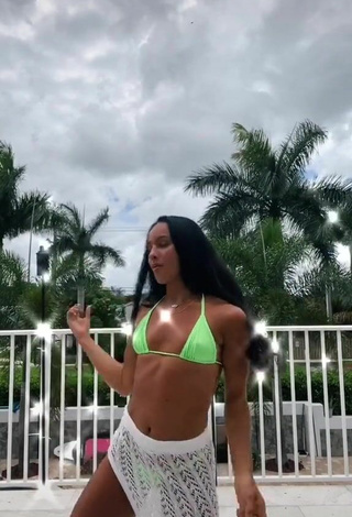 6. Sexy Gabi Butler Shows Cleavage in Light Green Bikini Top