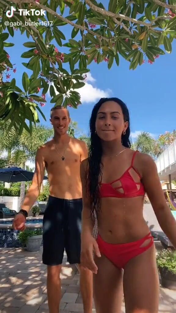 Hottie Gabi Butler Shows Cleavage in Red Bikini sexyfilter