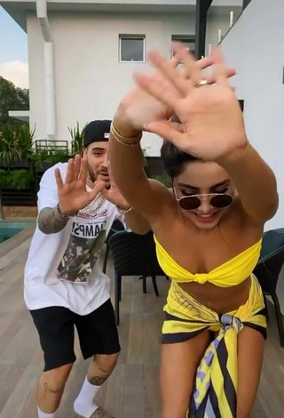 1. Hot Gabriela Versiani Shows Cleavage in Yellow Bikini Top