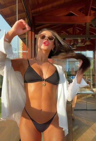 3. Sexy Gabriela Versiani Shows Cleavage in Black Bikini