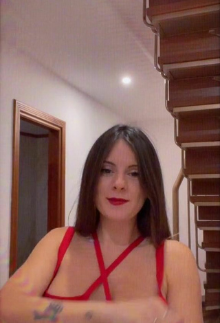 3. Sexy Gigiis Shows Cleavage in Red Dress