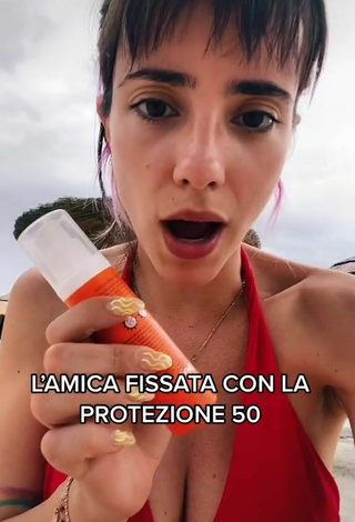 3. Hot Giulia Penna Shows Cleavage in Red Bikini Top
