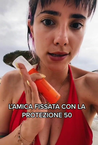 4. Hot Giulia Penna Shows Cleavage in Red Bikini Top