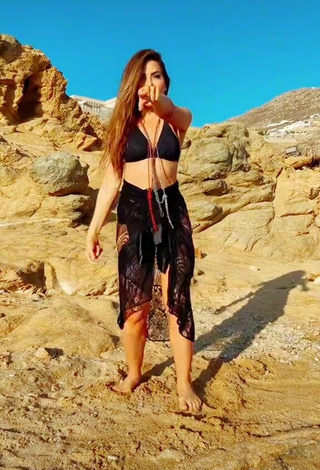 4. Sexy Gloria Trevi Shows Cleavage in Black Bikini Top