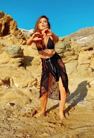 6. Sexy Gloria Trevi Shows Cleavage in Black Bikini Top