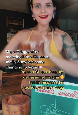 6. Sexy Shelly Shows Cleavage in Yellow Bikini Top