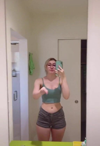 Cute Sydney Shows Cleavage in Olive Crop Top