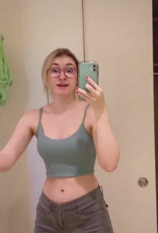 5. Cute Sydney Shows Cleavage in Olive Crop Top