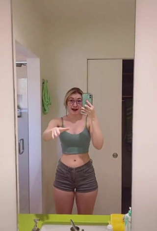 Hot Sydney Shows Cleavage in Olive Crop Top