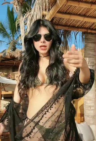 5. Sexy Aylin Criss Shows Cleavage in Olive Bikini