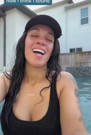 Sexy Biannca Prince Shows Cleavage in Black Swimsuit at the Swimming Pool