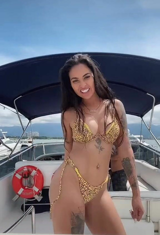 5. Sweetie Pamella Fuego Shows Cleavage in Leopard Bikini on a Boat