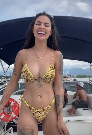 3. Hot Pamella Fuego Shows Cleavage in Leopard Bikini on a Boat