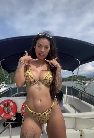 Sexy Pamella Fuego Shows Cleavage in Leopard Bikini on a Boat