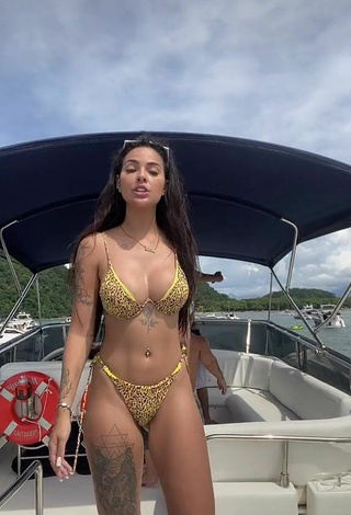 2. Sexy Pamella Fuego Shows Cleavage in Leopard Bikini on a Boat