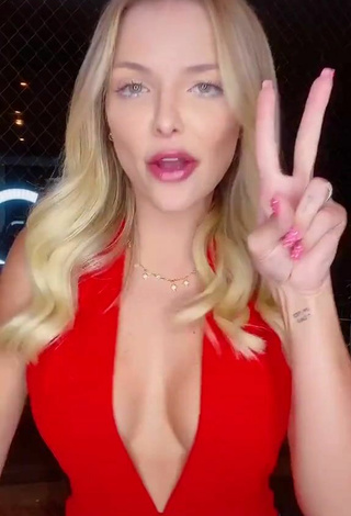 Sexy Carol Bresolin Shows Cleavage in Red Top