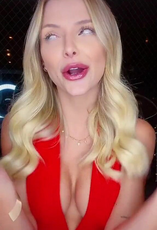 2. Sexy Carol Bresolin Shows Cleavage in Red Top
