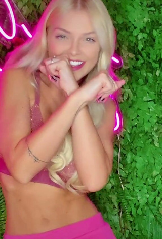 3. Sexy Carol Bresolin in Pink Bikini Top