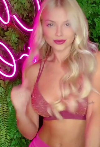 4. Sexy Carol Bresolin in Pink Bikini Top