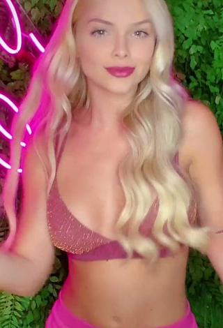 5. Sexy Carol Bresolin in Pink Bikini Top