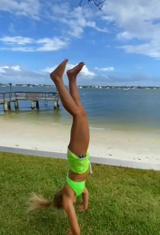 4. Cute Cassidy Thompson in Bikini Top at the Beach while doing Fitness Exercises