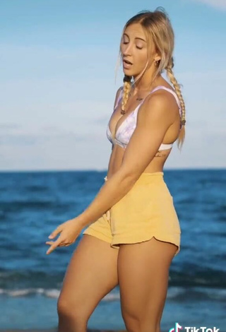 5. Hot Cassidy Thompson in Bikini Top at the Beach while doing Fitness Exercises