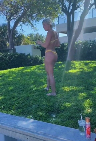 Cute Cassidy Thompson in Yellow Bikini at the Beach