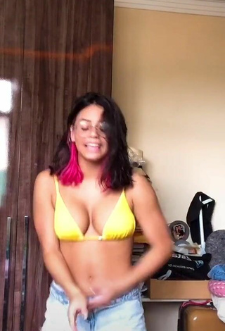 4. Breathtaking Maria Clara Garcia Shows Cleavage in Yellow Bikini Top