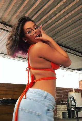 4. Cute Maria Clara Garcia Shows Cleavage in Orange Bikini Top