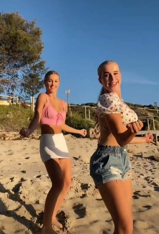 2. Sweetie Caitlin Cummins in Pink Crop Top at the Beach