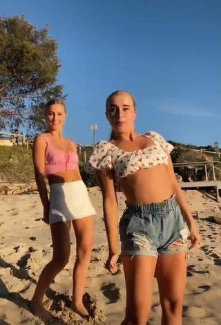 3. Sweetie Caitlin Cummins in Pink Crop Top at the Beach