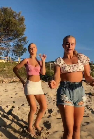 4. Sweetie Caitlin Cummins in Pink Crop Top at the Beach