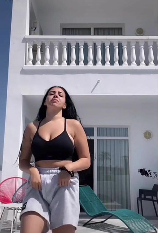 Beautiful Carla Flila Shows Cleavage in Sexy Black Crop Top