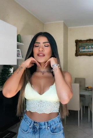3. Hot Cassandra Tejada Shows Cleavage in White Crop Top