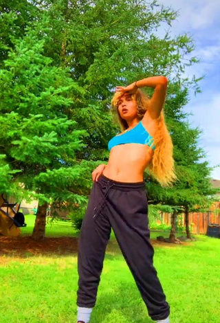 2. Hottest Cassidy J in Turquoise Crop Top