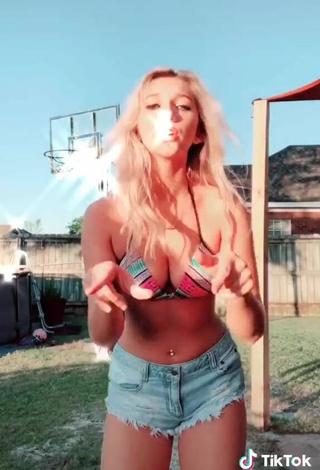 4. Hot Heather Dale Shows Cleavage in Striped Bikini Top