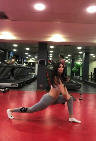 5. Sexy Danielle Haden in Grey Leggings while doing Fitness Exercises