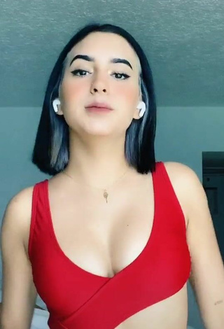 Erotic Dominik Elizabeth Resendez Robledo Shows Cleavage in Red Swimsuit