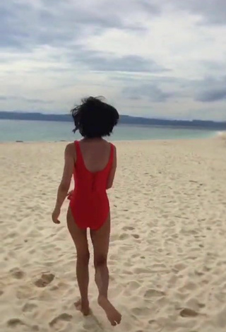 1. Sexy Edina Enriquez in Red Swimsuit at the Beach