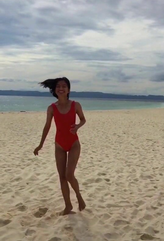 2. Sexy Edina Enriquez in Red Swimsuit at the Beach