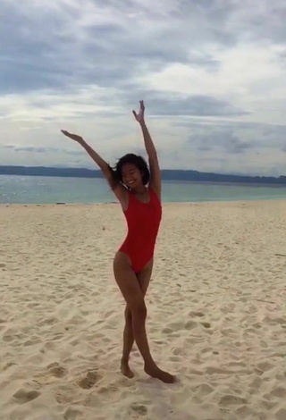 Sexy Edina Enriquez in Red Swimsuit at the Beach