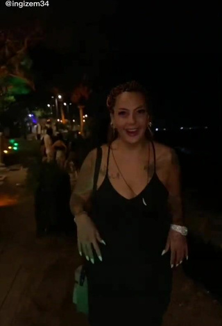 3. Sweetie ingizem34 Shows Cleavage in Black Dress in a Street