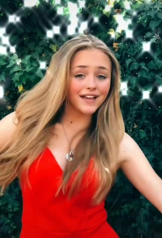 4. Sexy Bella Messens Shows Cleavage in Red Dress